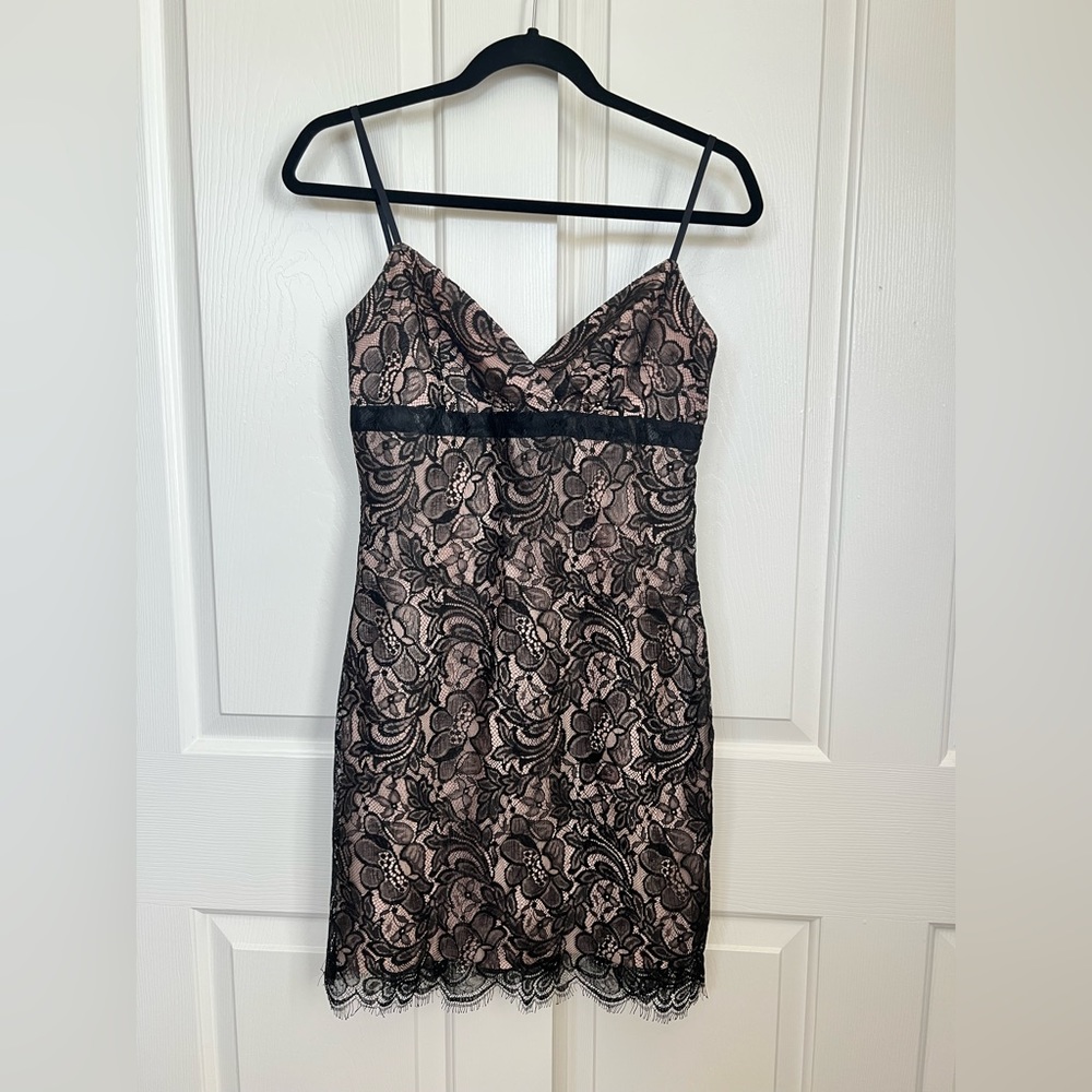 BCBGMaxAzria gorgeous lace mini dress. Fully lined, adjustable straps.